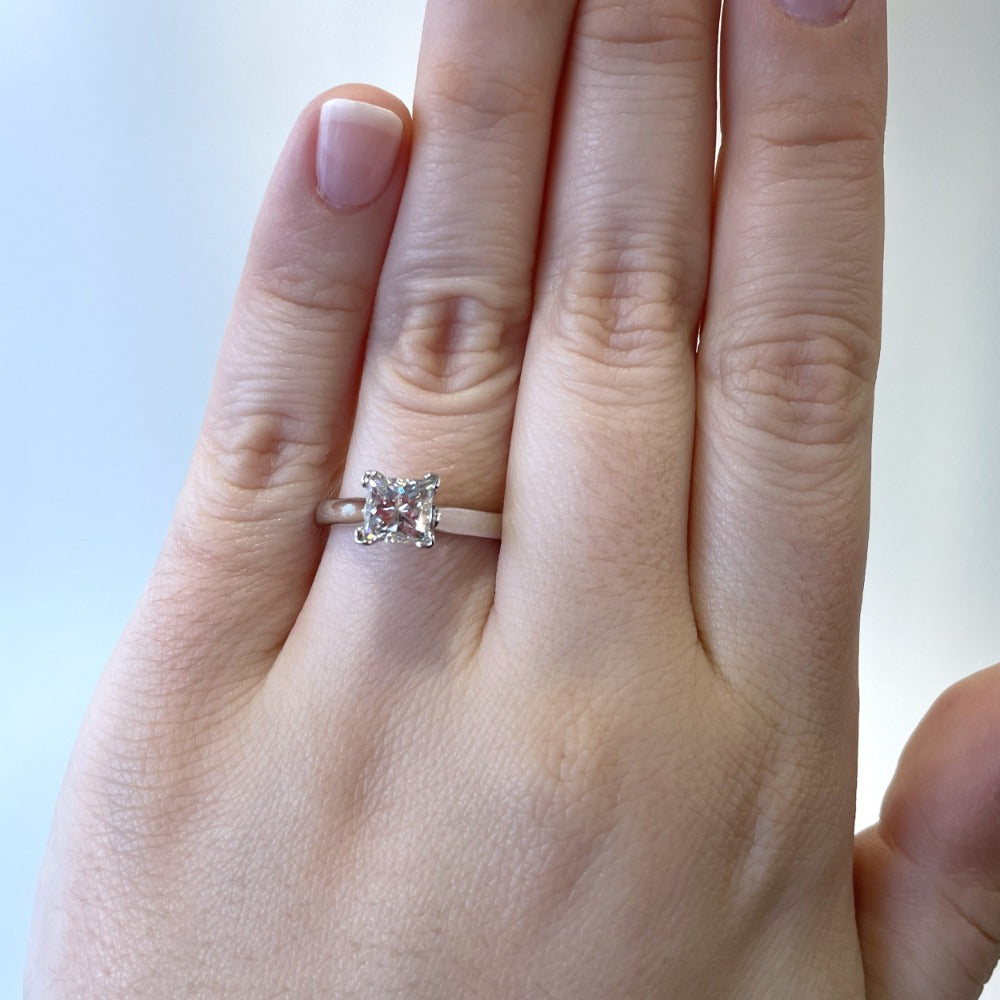 1.56 ct princess cut solitaire engagement ring on model