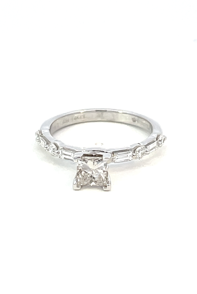 top view of 14kw princess cut diamond engagement ring with baguette and round diamond accents