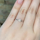 10kw round halo style engagement ring on model