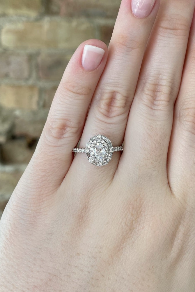 14kw oval cut double halo engagement ring on model