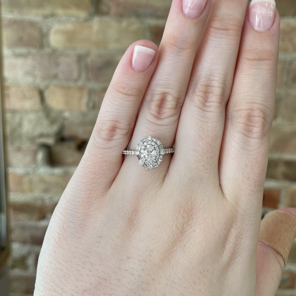 14kw oval cut double halo engagement ring on model