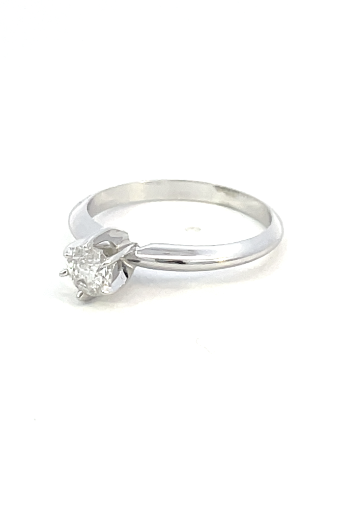 side view of 1/3 carat diamond solitaire engagement ring.