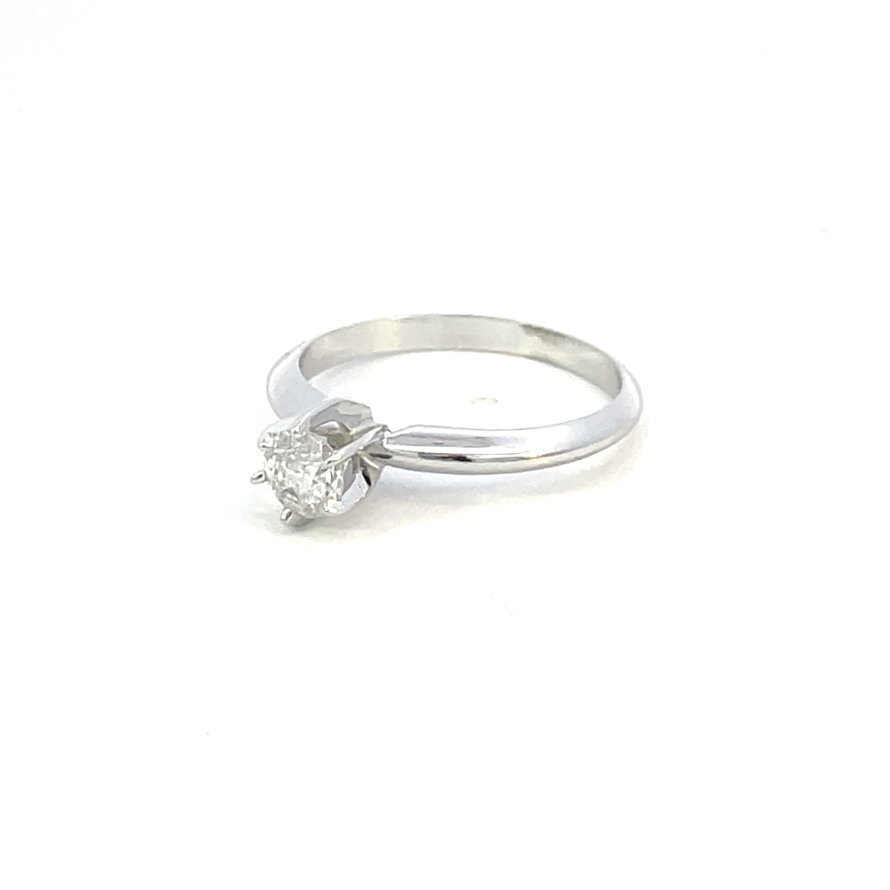 side view of 1/3 carat diamond solitaire engagement ring.