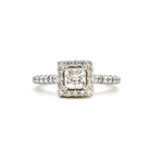 front view of princess cut diamond halo style engagement ring.