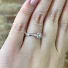 view of side of ring on models hand