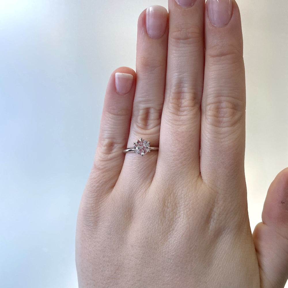 14kw 1ct round diamond solitaire engagement ring on model
