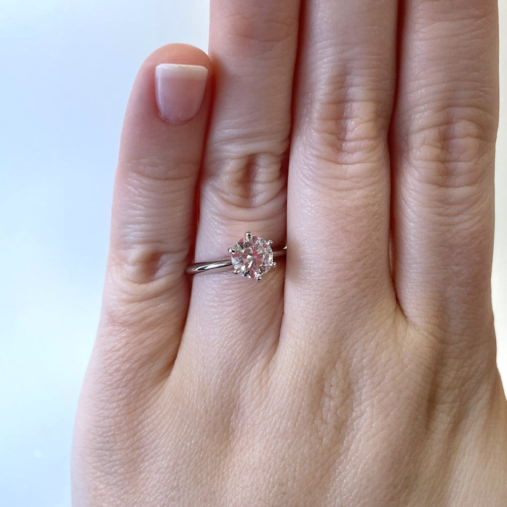 14kw 1ct round diamond solitaire engagement ring on model