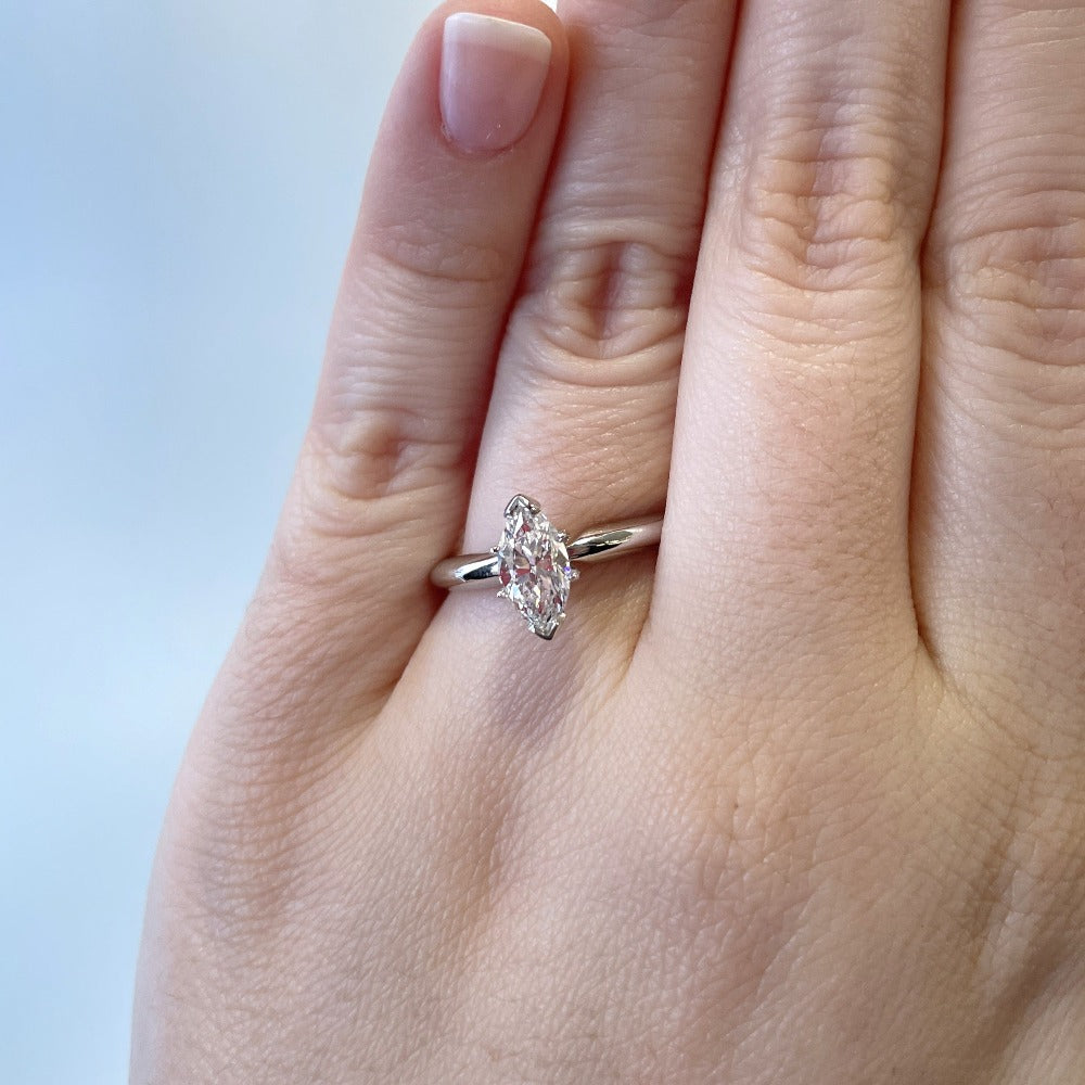 closer view of 14kw 1ct marquise cut diamond engagement ring on model