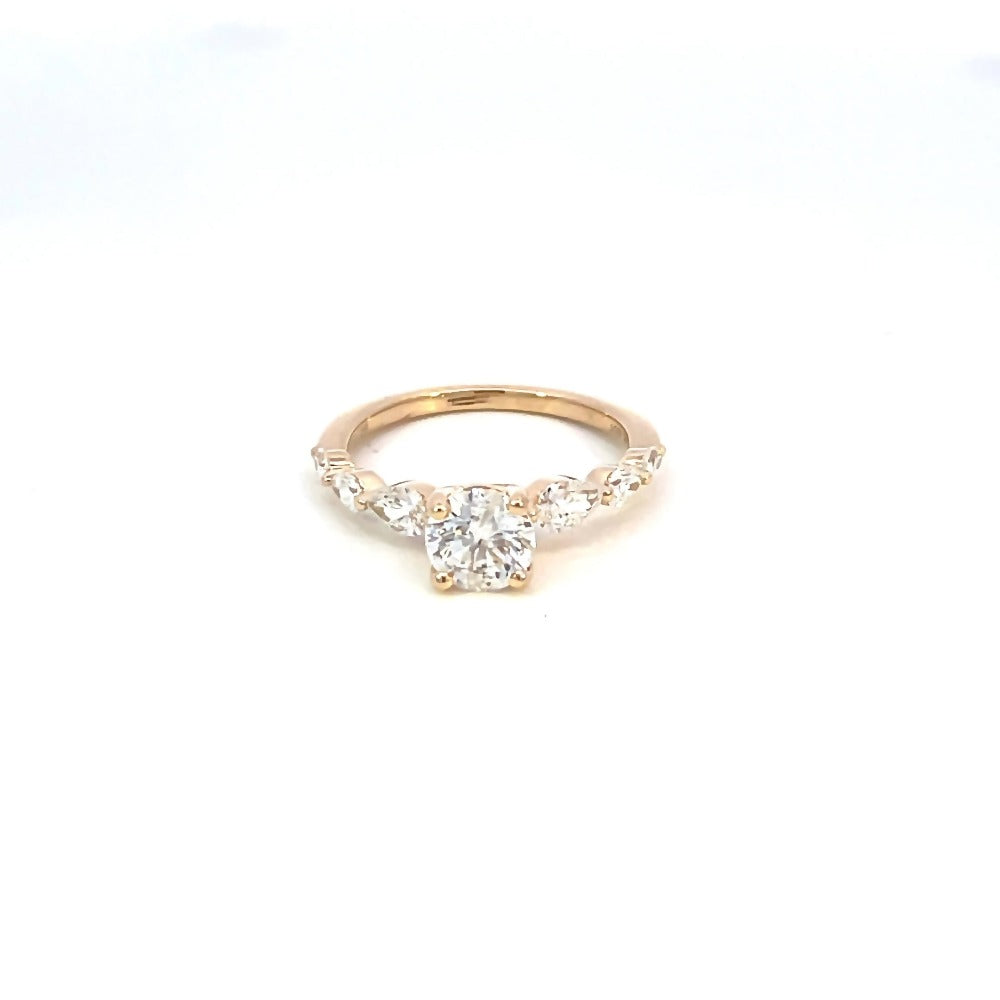 top view of 14ky SallyK diamond engagement ring with round center and pear side stones