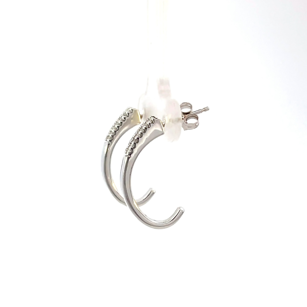 side view of 14kw diamond hoop earrings