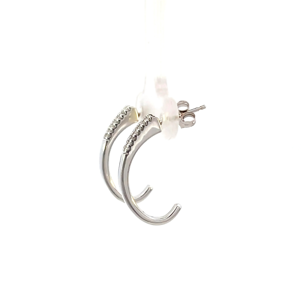side view of 14kw diamond hoop earrings