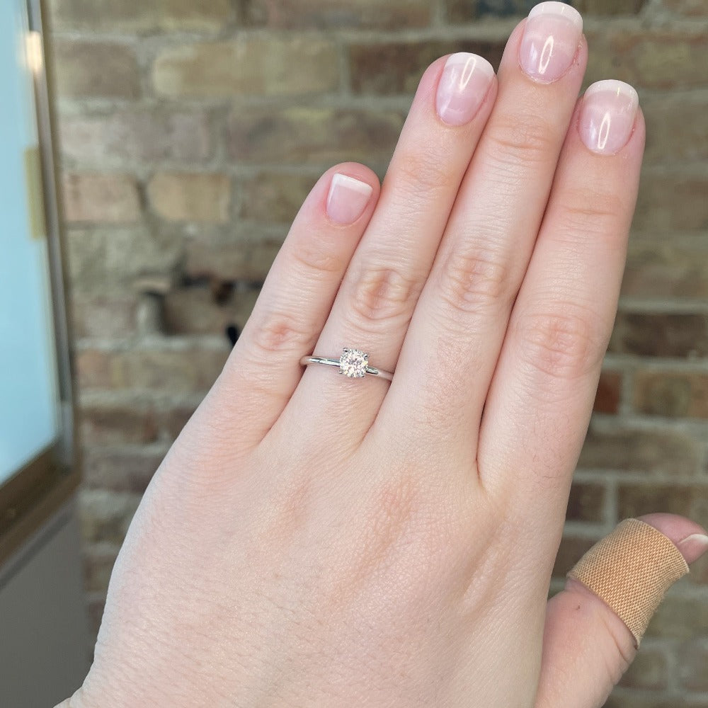 14kw SallyK Accented Solitaire engagement ring on model