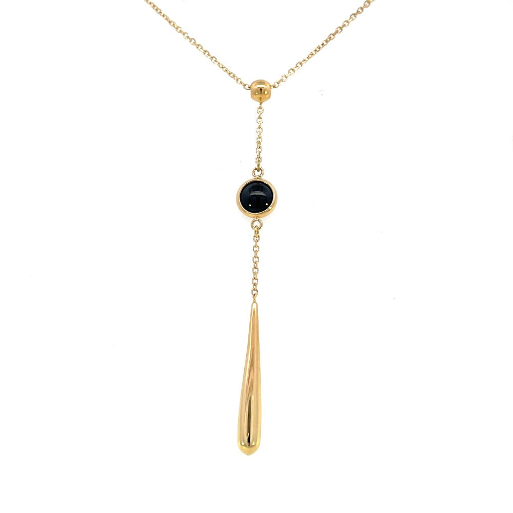 detail view of 14k yellow gold "Y" style necklace with bezel set black onyx drop and gold tear shaped dangle