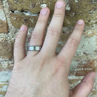 6mm Men's Cobalt Chrome Band with Beveled Edge on hand