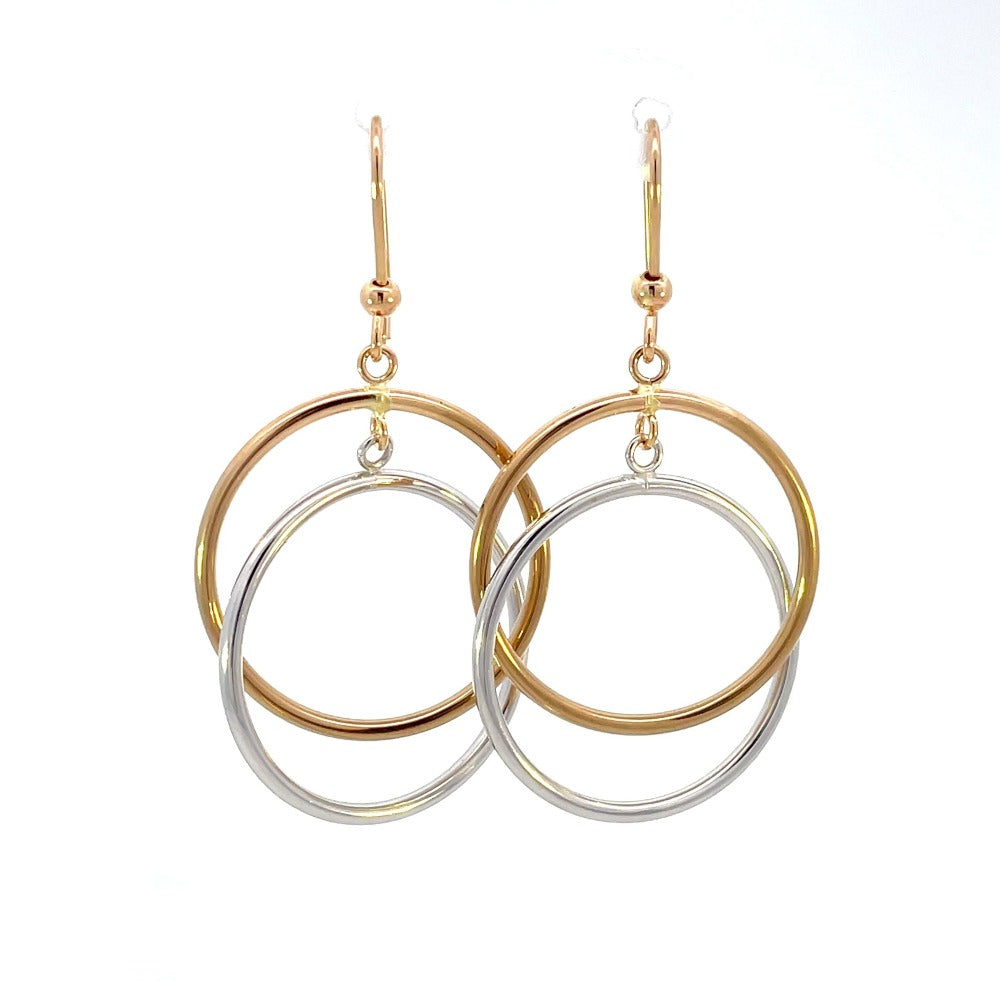 front view of 14 karat two-toned gold circle dangle earrings