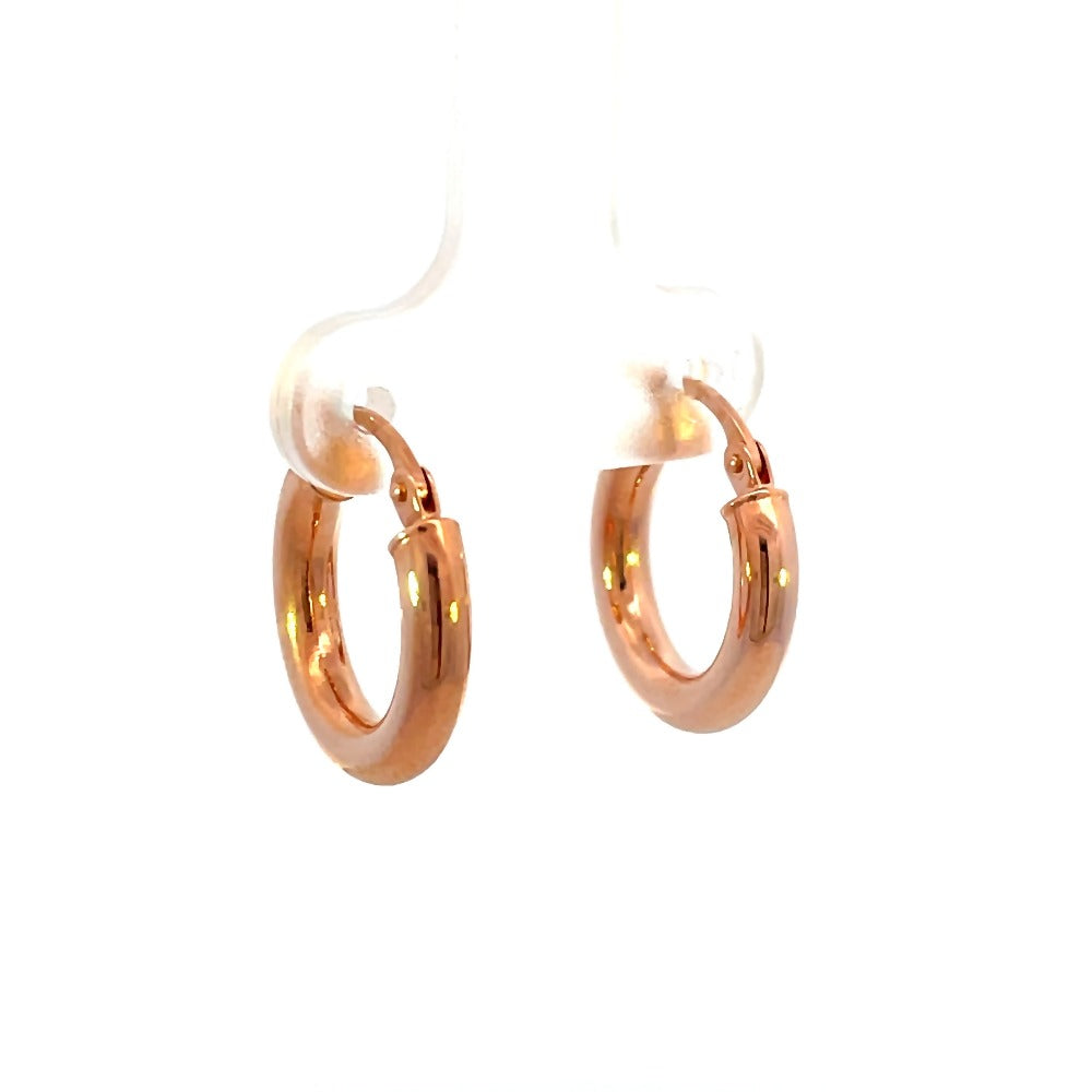 Front view picture of 10mm 14k rose gold tube hoop earrings. Picture shows the thickness of the metal.