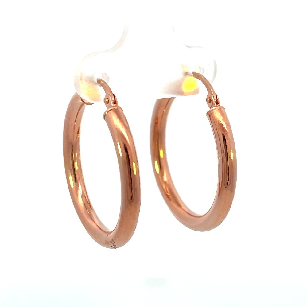 front view of 20mm 14k rose gold hoop earrings. picture shows thickness of metal.
