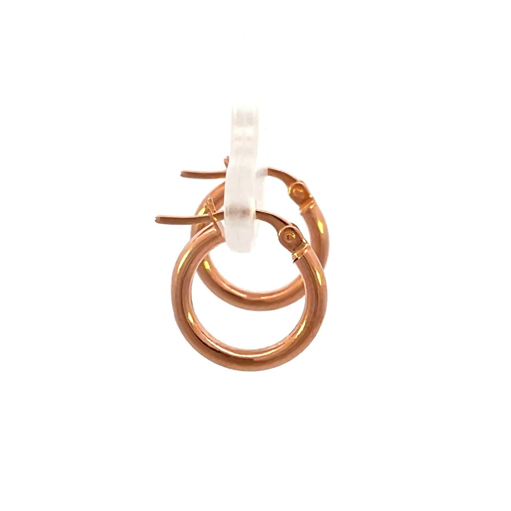 side view of 14k rose gold hoops that shows the size of the hoop and the closure.
