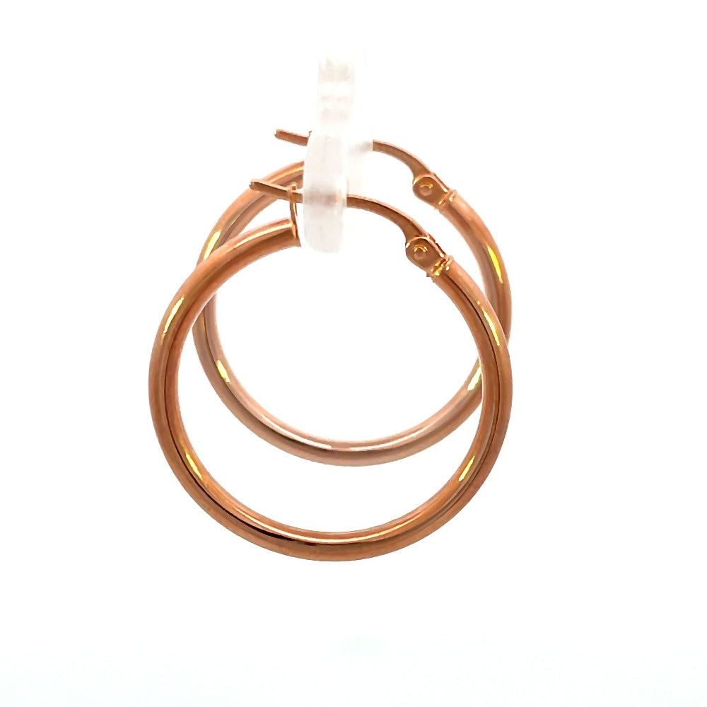 side view of 20mm 14k rose gold hoop earrings that shows the side of the earrings as well as a the closure.