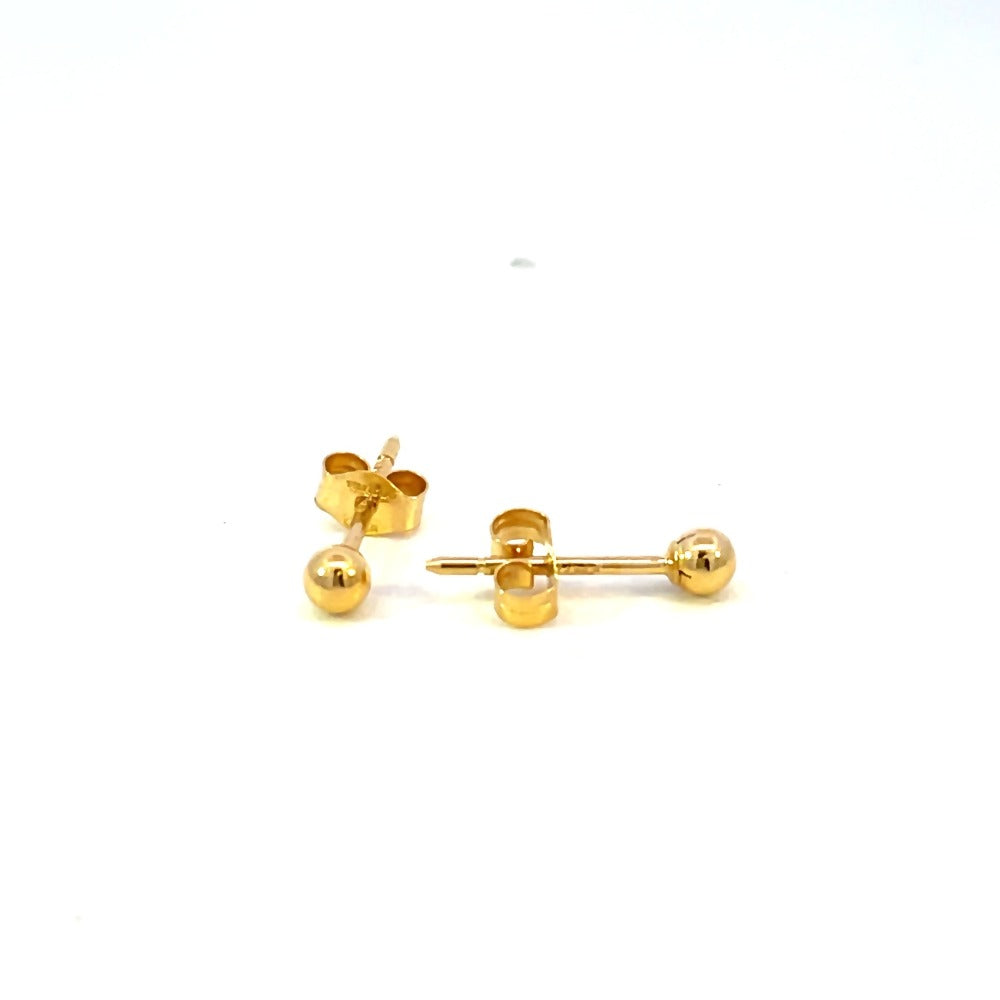 side view of 3mm gold ball earrings. picture shows backs on earrings.