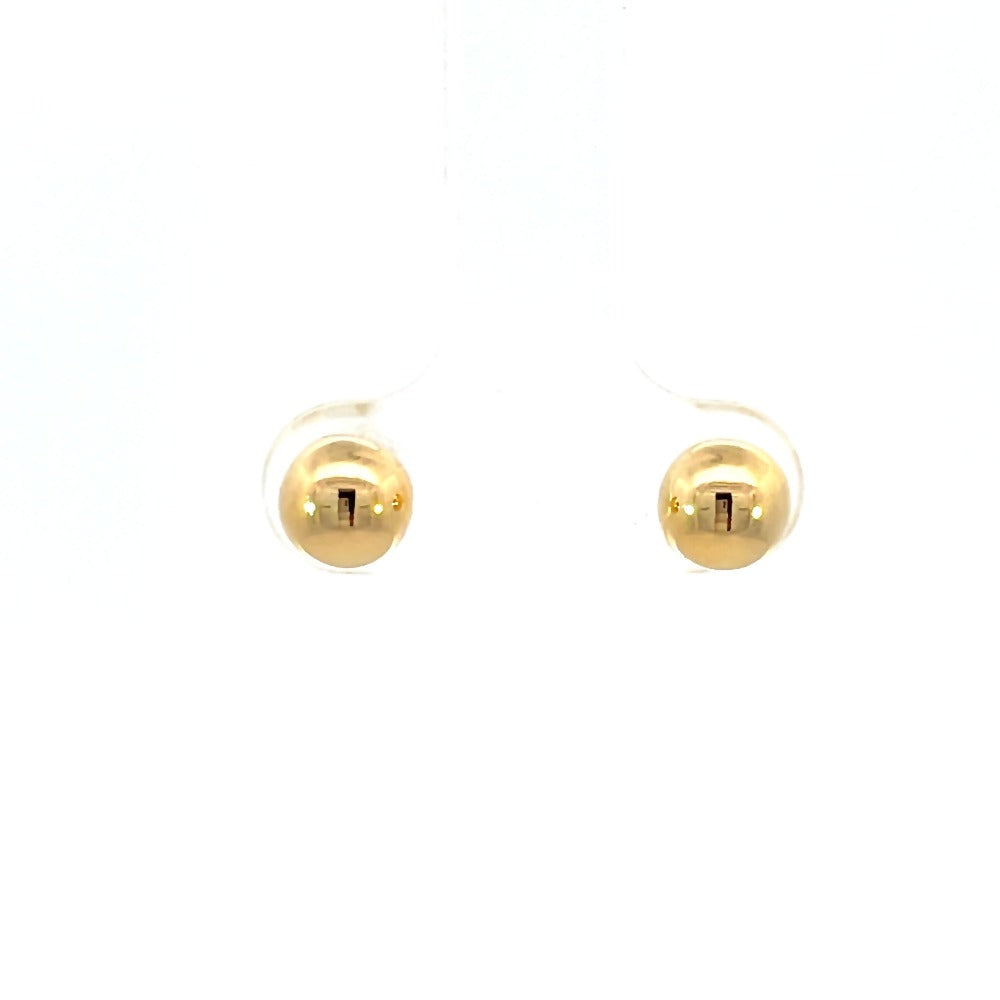 front view of 6mm gold ball earrings.