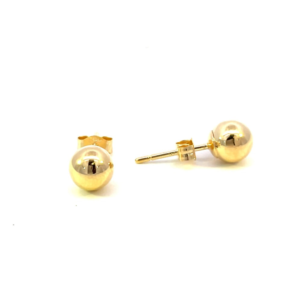 side view of 6mm gold ball earrings. picture shows earrings backs.