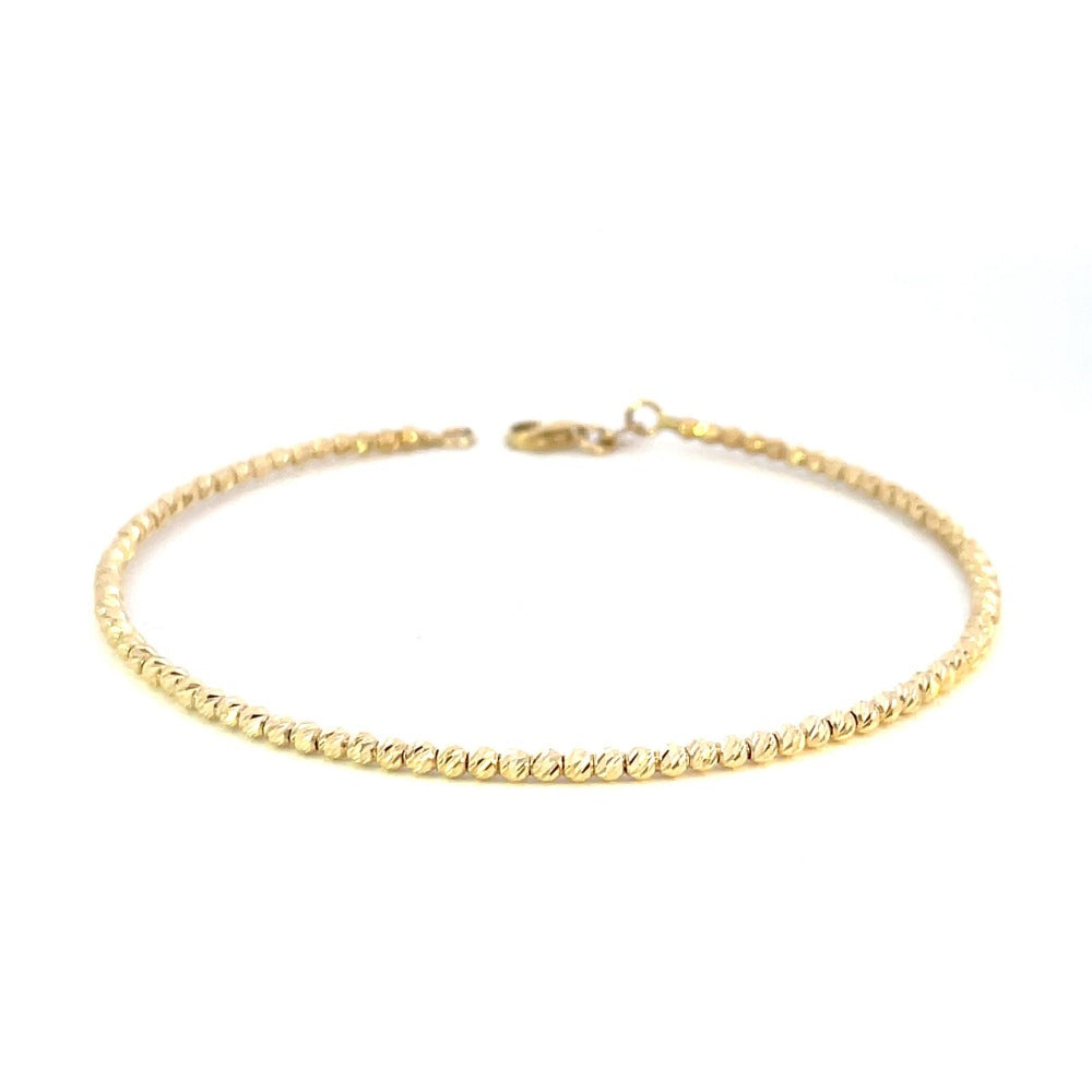 front view of 14ky beaded bracelet with diamond cutting on the beads