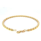 back view of the 14ky beaded cuff bracelet that shows the lobster clasp and karat stamps