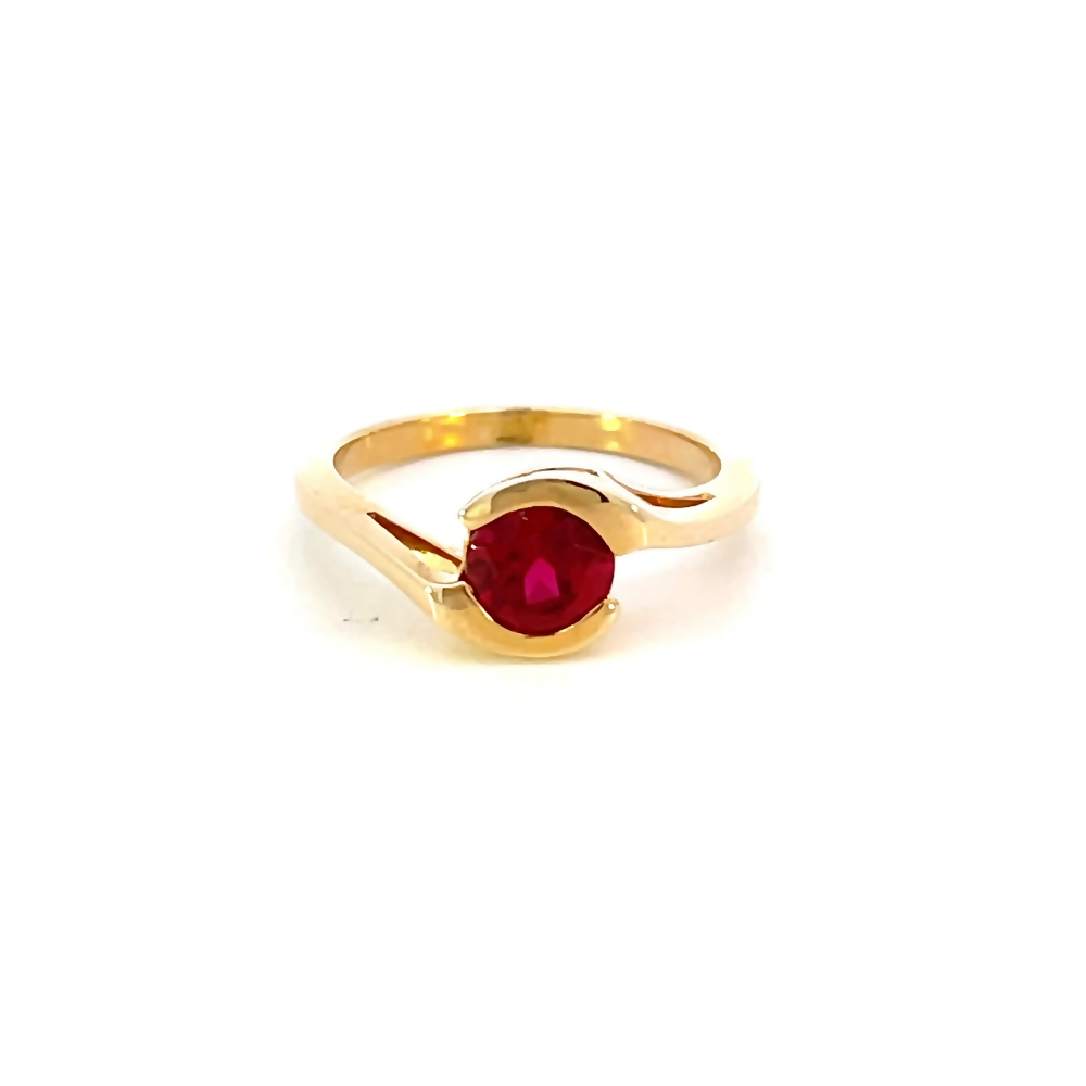 front view of 14 karat yellow gold created ruby ring