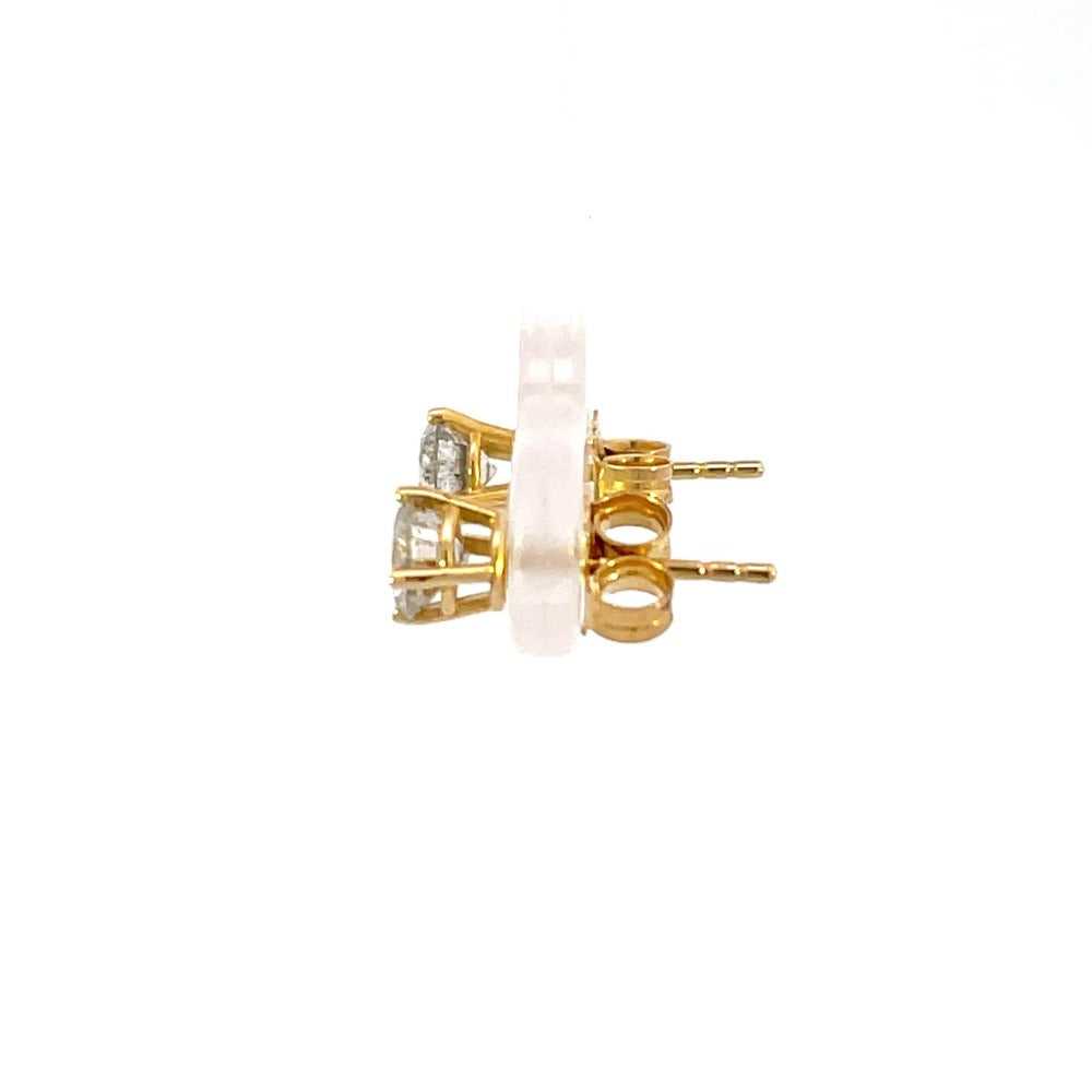 side view of 10ky diamond stud earrings from estate case.