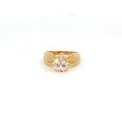 front view of 10 karat yellow gold ring with wide band and pear cut pink center stone