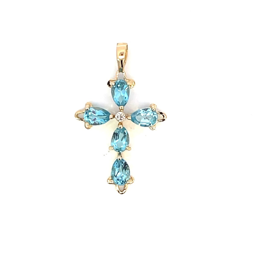 detail view of 14ky blue topaz cross with diamond accent