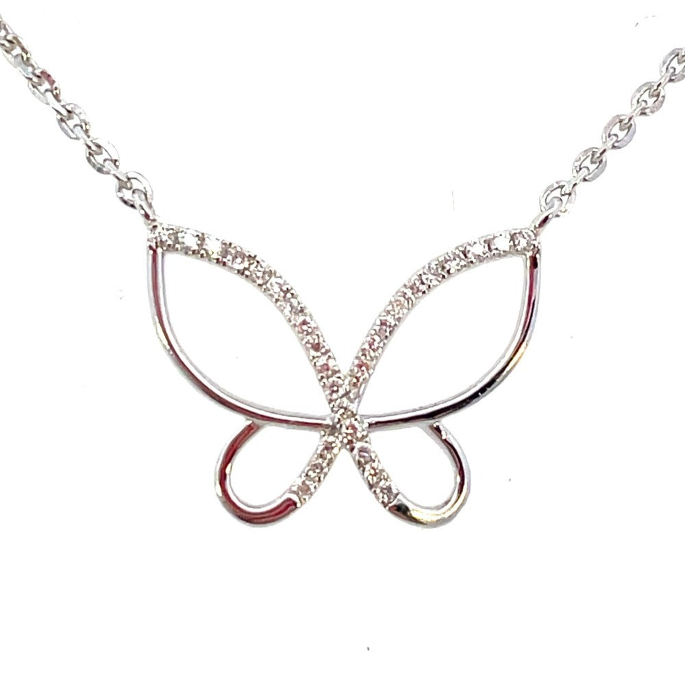 10KW Lab Grown Diamond Butterfly Pendant 1/12 CTW close up on pendant