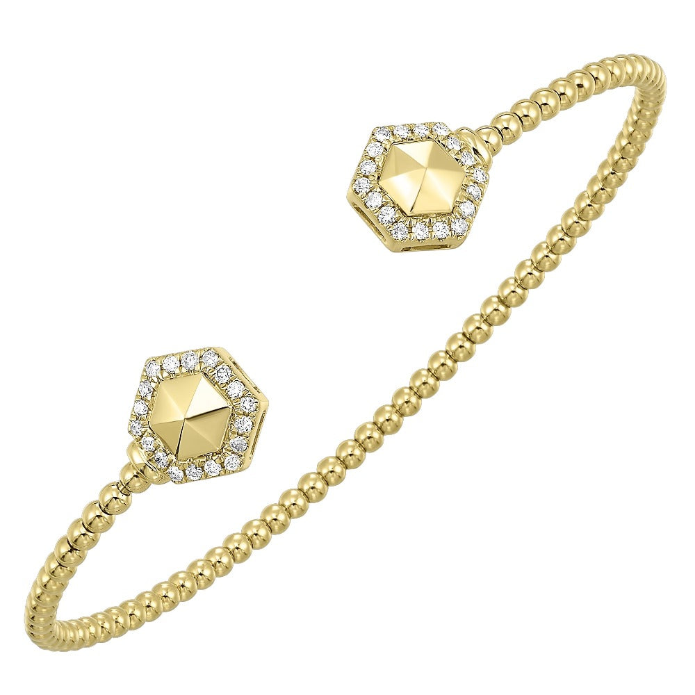 detail view of 14ky bangle bracelet with diamonds.