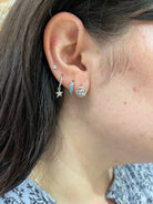 Sterling Silver Double Love Knot Earrings being worn