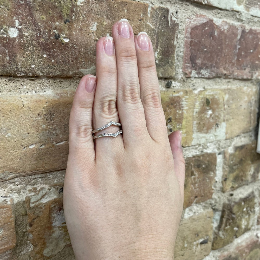 Round and Baguette Cut Diamond Guard 1/4 CTW on hand