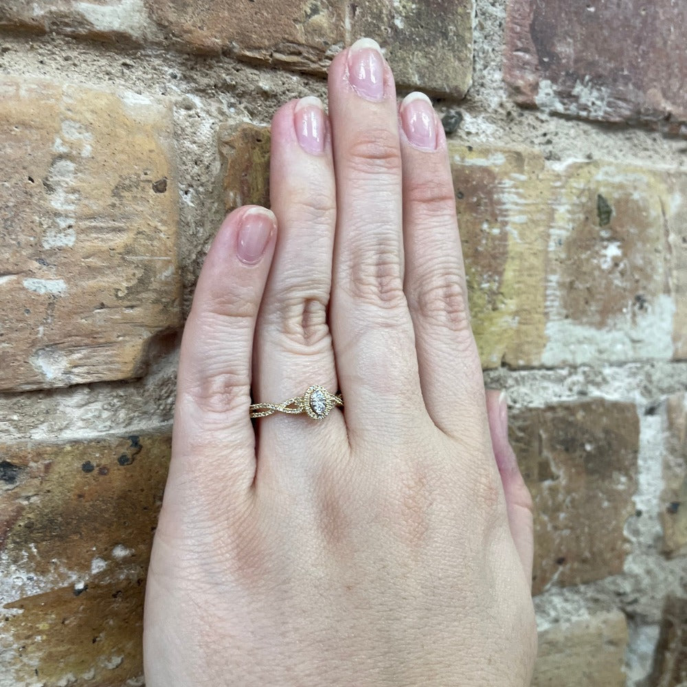 10K Yellow Gold Diamond Engagement Ring .17 CTW on model