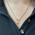 14K Gold Padlock Shaped Pendant Lock and chain on model