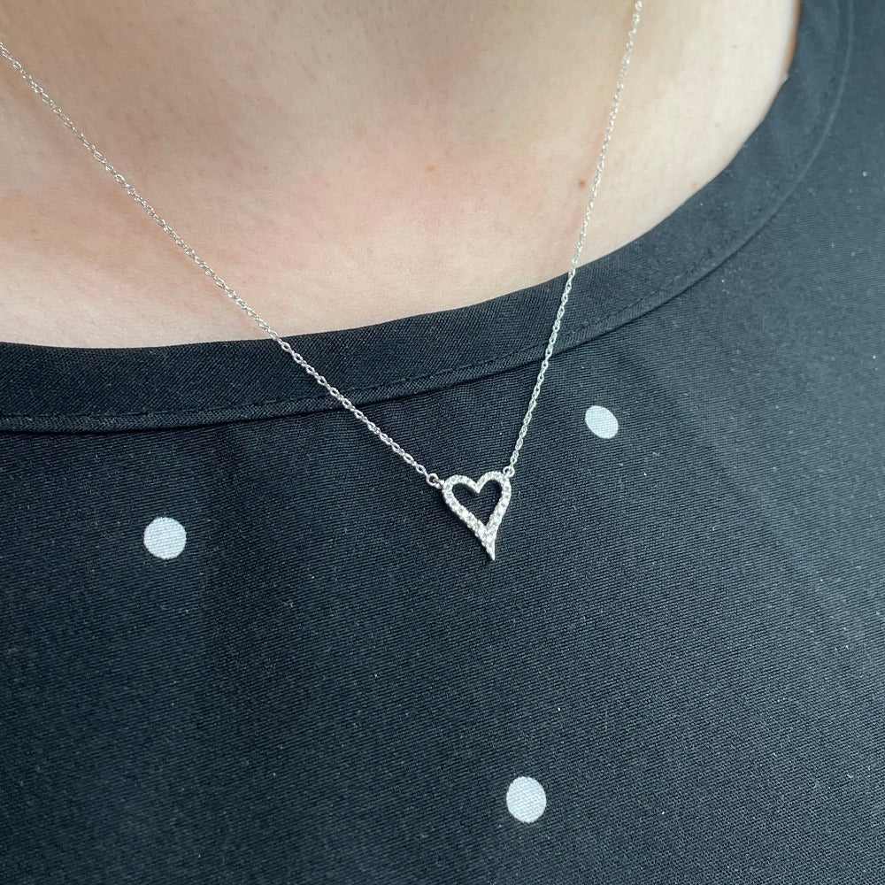 White Gold & Diamond Stationary Open Heart Pendant on model