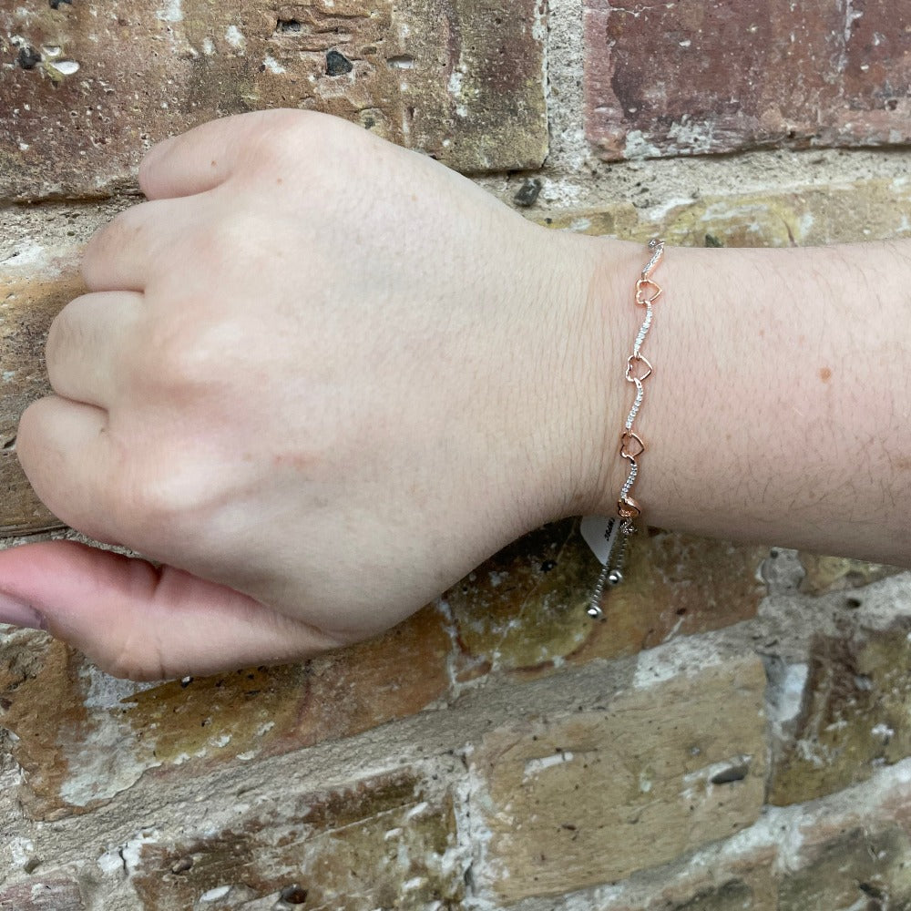 Sterling Silver & Diamond Heart and Ribbon Link Bolo Bracelet with Rose Gold Overlay on model