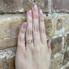 10KY Intertwined Circle Diamond Fashion Ring 1/20 CTW on model