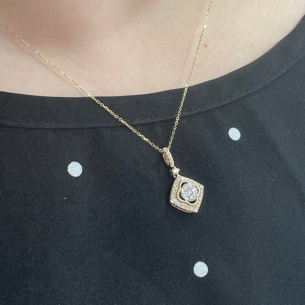 14K Two-Toned Drop Diamond Cluster Pendant 1/2 CTW on model