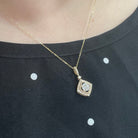 14K Two-Toned Drop Diamond Cluster Pendant 1/2 CTW on model