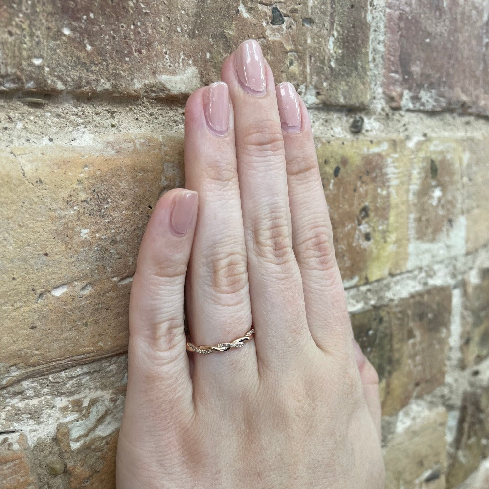 10KR Twisted Diamond Band 1/20 CTW | Stackable Ring on model