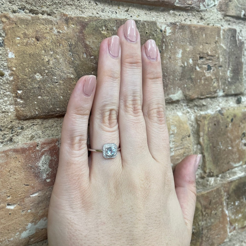 10KW Aquamarine and Diamond Halo Style Ring 1/12 CTW