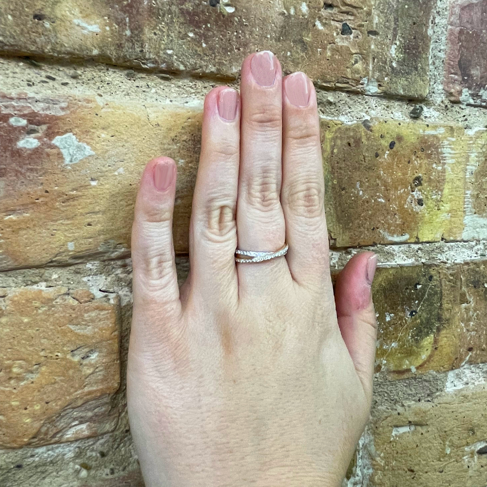 14K Two Toned Criss Cross Diamond Band .25 CTW on hand