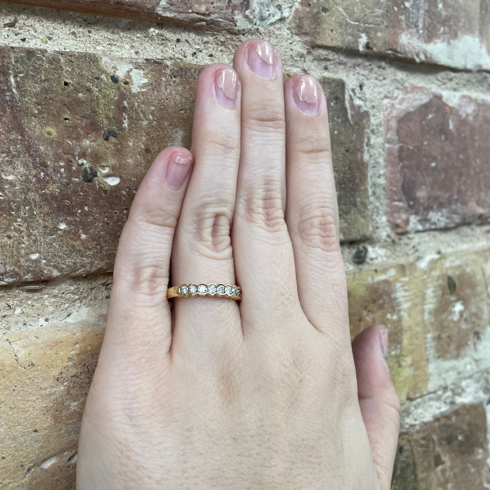 14KY Pinched Channel Set Diamond Band 1/3 CTW on hand