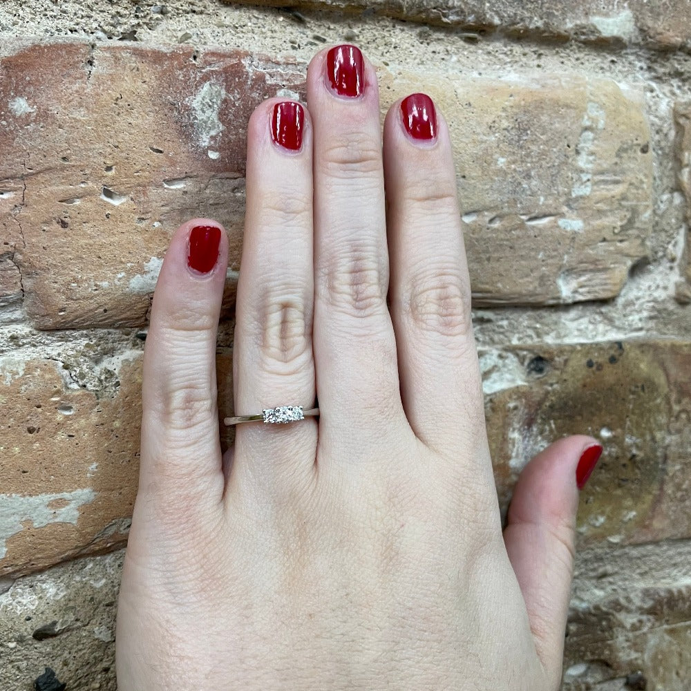 14KW Three Stone Diamond Ring .24 CTW on model