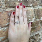 14KW Two Stone Lab Grown Pear and Round Cut Diamond Ring 1.50 CTW on model