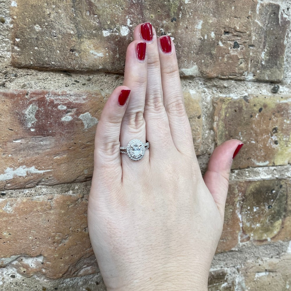 1.03 CTW Oval Lab Grown Diamond Ring with Double Halo and Split Shank on model
